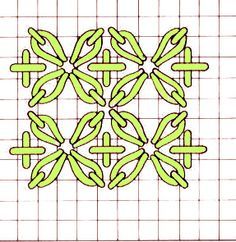 a drawing of a flower on a gridded surface with lines in the middle and green leaves at the center