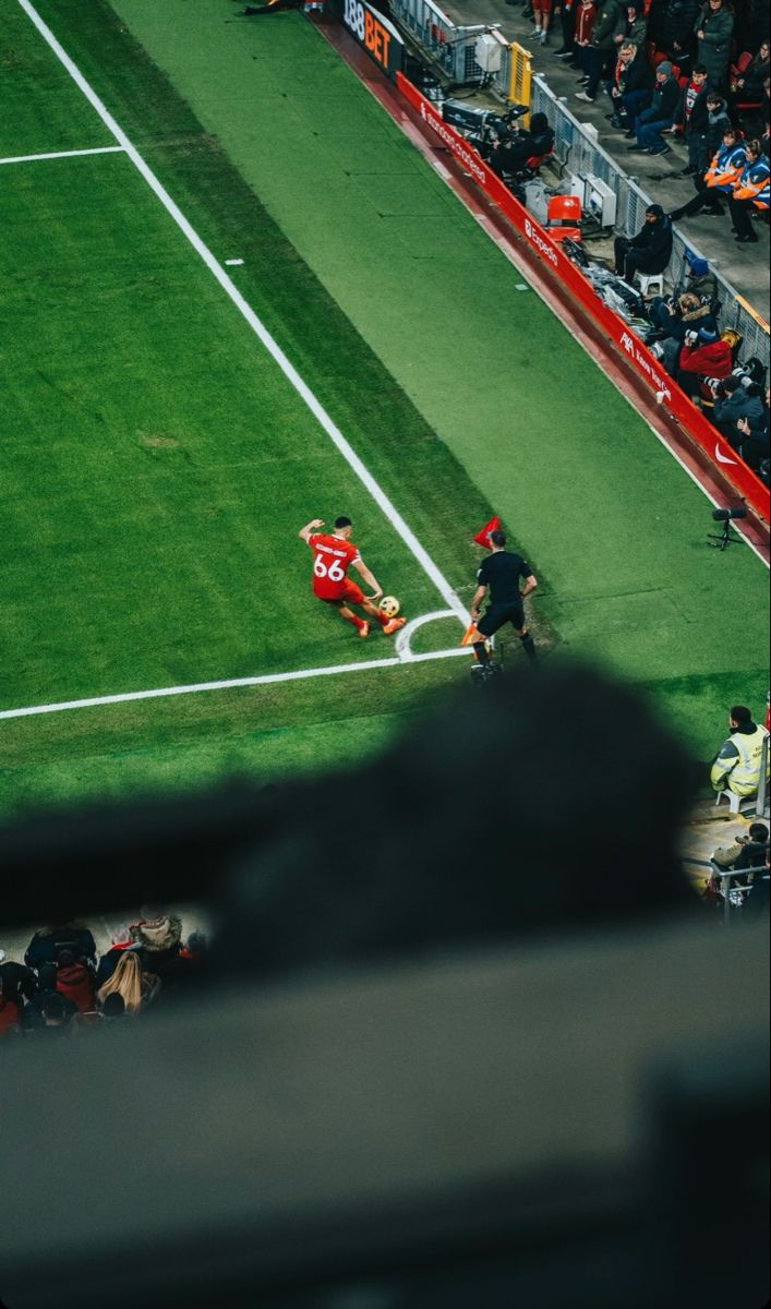 two soccer players on the field during a game