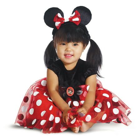 Dress your child in the charming Red Minnie Mouse Toddler Classic costume and watch them sparkle just like Minnie herself! This adorable ensemble includes a dress with a multilayered polka dot skirt, a bow at the waist, a sculpted character cameo, and puff sleeves. Complete the look with a super cute Minnie ear headband, perfect for adding an extra touch of magic. Whether it's for Halloween, themed parties, or playtime fun, this costume is sure to make your toddler feel sweet and stylish. Let yo Baby Minnie Mouse Costume, Minnie Mouse Kostüm, Disney Kızları, Minnie Mouse Halloween Costume, Minnie Costume, Minnie Dress, Minnie Mouse Costume, Baby Kostüm, Minnie Mouse Halloween