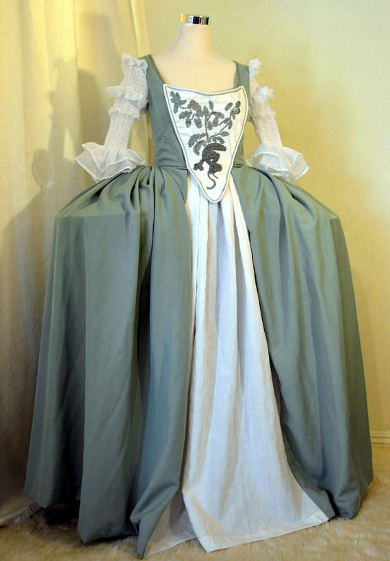 We proposed for customer order ONLY wedding dress for Claires wedding dress from Outlander historical period drama and fashion show. We offer dress in two variations: - Standard level: Dress has extensive embroidery on top, fine design on sleeves for screen accurate version of dress. Fabrics: cotton and linen from Italy, high quality. - Economy level: design is respected but top has not embroidery and sleeves have just a ruffle at the end. Fabrics: polyblend. Neckline and front opening are f... Vintage Historical Ball Gown For Costume Party, Rococo Victorian Wedding Dress, Historical Baroque Wedding Dress, Regency Victorian Dress For Debutante Ball, Regency Style Historical Ball Gown For Costume, Regency Style Gown For Debutante Ball With Historical Design, Elegant White Medieval Dress For Costume Party, Regency Style Medieval Wedding Dress, Elegant Ball Gown With Historical Design For Costume Party