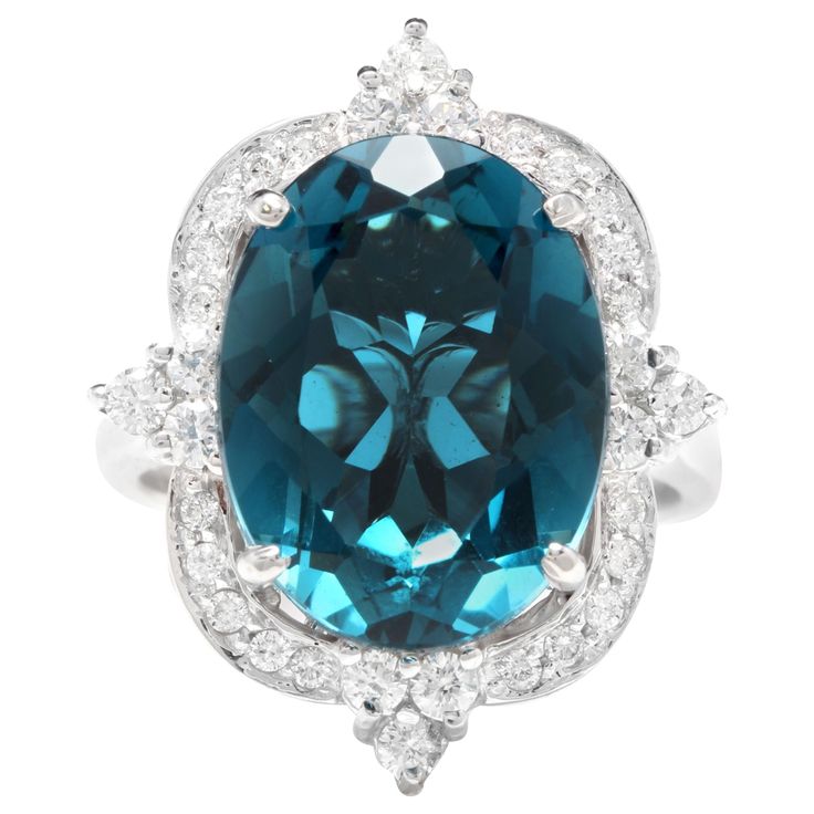 12.75 Carats Natural Impressive London Blue Topaz and Diamond 14K White Gold Ring Total Natural London Blue Topaz Weight: Approx. 12.00 Carats London Blue Topaz Measures: Approx. 15 x 11mm Natural Round Diamonds Weight: .75 Carats (color G-H / Clarity SI1-SI2) Ring size: 7 (we offer free re-sizing upon request) Ring total weight: 9.0 grams SKU #557 Emerald Cut Rings, London Blue Topaz Ring, Gold Cocktail Ring, Etsy Gold Ring, Rings Diamond, Diamond Cocktail Rings, Pink Topaz, Star Jewelry, 14k White Gold Ring