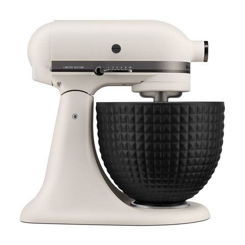 a white and black kitchen mixer on a white background