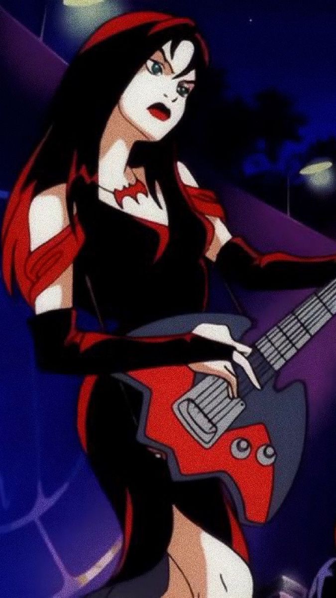 a woman in black and red holding a guitar