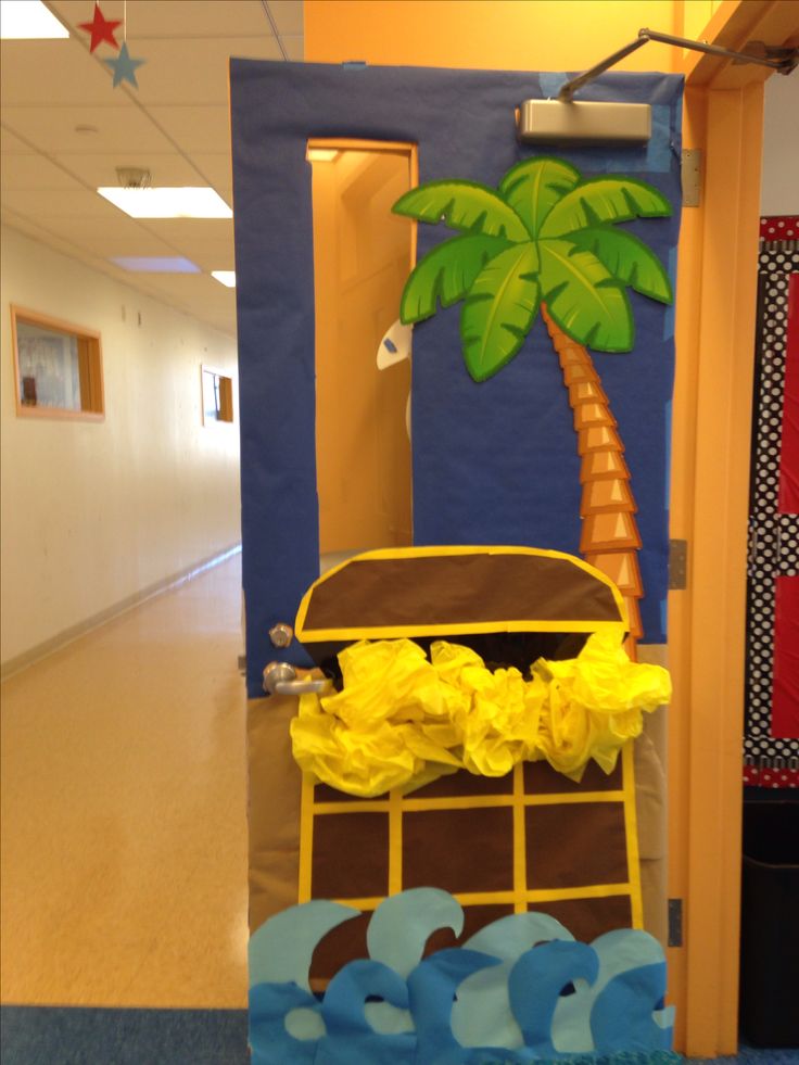 an office hallway decorated in blue, yellow and brown with a palm tree on the wall