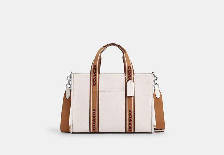 The Smith Tote Bag is crafted of Pebbled Leather that exudes sophistication. With a spacious interior this designer leather tote bag can carry all your essentials and then some—from your laptop to your favorite book. The Smith Tote comes with a detachable crossbody strap and the freedom to wear it your way. Silver Penny, Coach Tote Bags, Coach Tote, Coach Outlet, Tote Bag Purse, Vintage Coach, Leather Tote Bag, Womens Tote Bags, Pebbled Leather