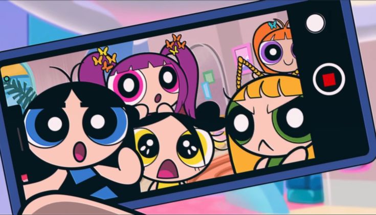 the powerpuff girls cartoon is playing on an iphone screen and it's being watched by someone else