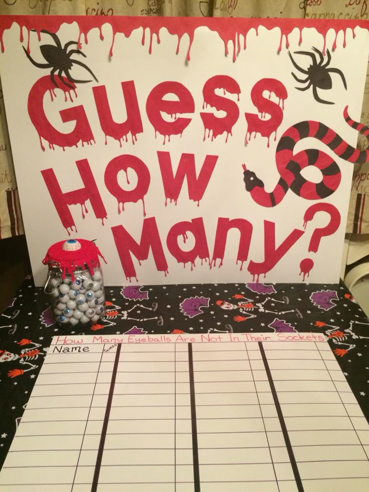 a game board with the words guess how many? on it and a spider theme