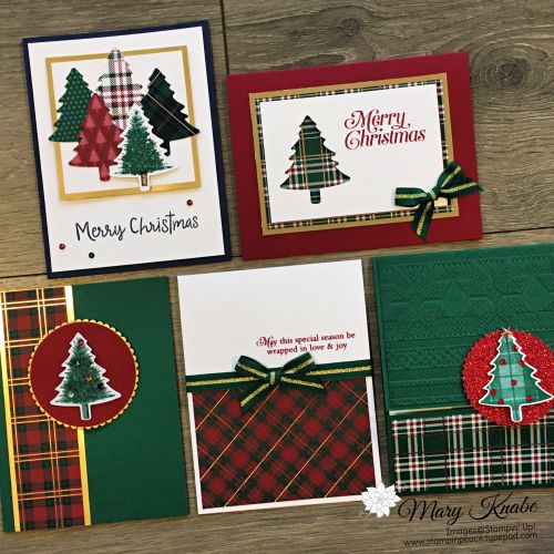 four christmas cards with different designs on them, one has a tree and the other has plaid