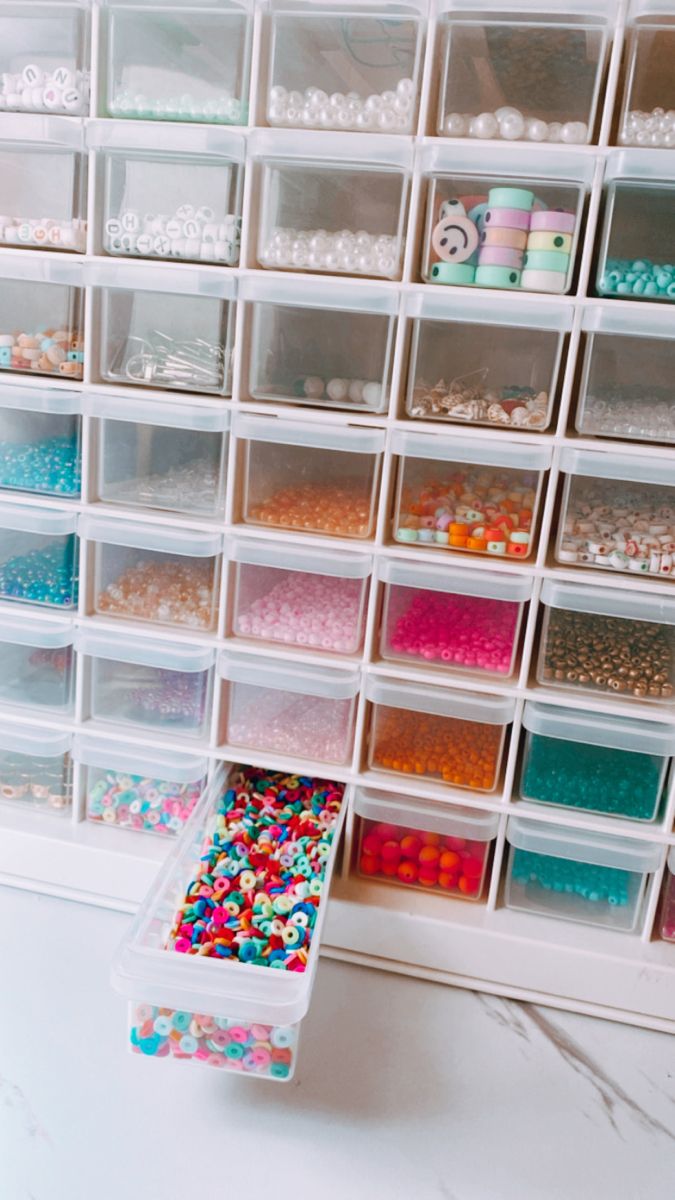 the craft room is filled with lots of beads and sprinkles for storage