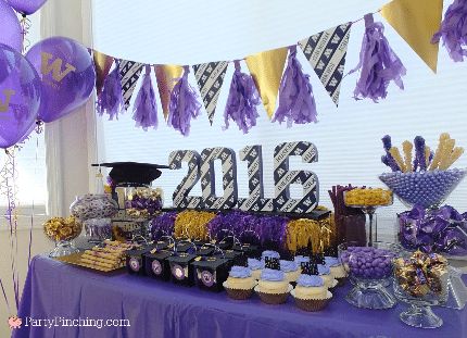 a purple and gold graduation party dessert table with balloons, streamers, cupcakes and decorations