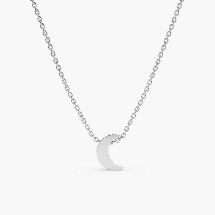 Luna Keep your dreams close with our dainty Mini Plain Gold Moon Pendant Necklace. This celestial charm features a solid 14k gold moon pendant with a touch of thickness for a dimensional look. The minimal design and polished gold finish create a timeless and versatile piece that complements any outfit. Crafted from high-quality 14k gold (available in yellow, white, or rose gold), this necklace offers long-lasting durability and a touch of luxury. - Handmade- Solid Gold- Size of Moon: 7 x 5 mm- The thickness of the Moon: 2 mm All pieces come beautifully boxed in suede pouches you can always use when traveling! Minimalist Crescent Moon Phase Charm Necklace, Minimalist Half Moon Phase Necklace, Minimalist Jewelry With Moon Charm, Minimalist Half Moon Necklace With Adjustable Chain, Minimalist Moon Shaped Jewelry In 14k Gold, Minimalist Jewelry With Adjustable Half Moon Chain, Minimalist 14k Gold Moon Jewelry, Minimalist Moon Shaped 14k Gold Jewelry, Dainty Crescent White Gold Necklace