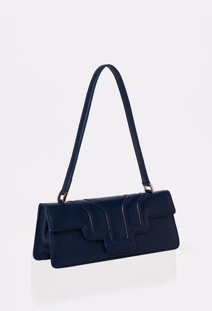 The epitome of quiet luxury. Born a few years ago in our atelier, this model returns, thanks to the enduring appeal of its design. It is a testament to its timelessness, making it a true classic in the world of fashion. Whether you're out for a casual day or attending a formal event, it ensures that you are impeccably styled. Modern Blue Flap Bag For Formal Occasions, Classic Blue Rectangular Shoulder Bag, Navy Rectangular Shoulder Bag For Evening, Classic Blue Formal Flap Bag, Classic Baguette Bag For Office With Dust Bag, Elegant Navy Bag For Everyday, Elegant Navy Bag For Daily Use, Luxury Blue Flap Bag For Formal Occasions, Blue Luxury Flap Bag For Formal Occasions