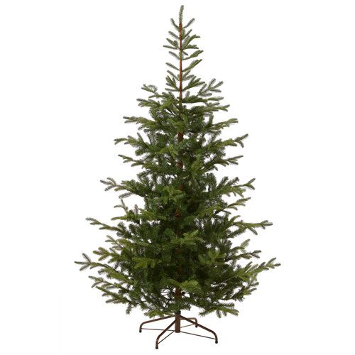 a small christmas tree on a white background