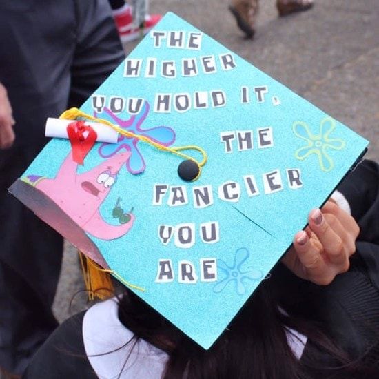 a blue graduation cap with the words, the higher you hold it, the fancifer you are