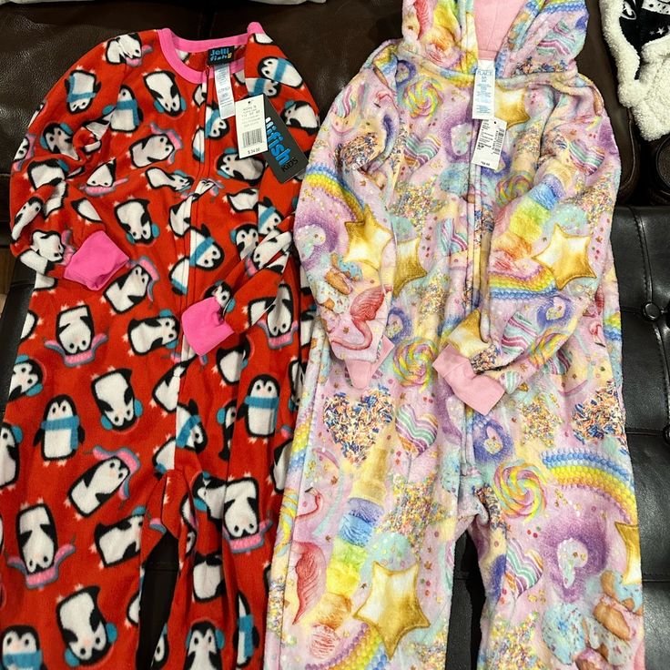 Girls Nwt Fleece Footless Zip Up Pajamas Bundle Penguin Fleece Onesie Is Size 4/5 But Runs Big Children’s Place Candy Fleece Onesie Is Size 5/6 Winter Onesie For Sleepover In Pink, Pink Winter Onesie For Sleepover, Winter Pink Onesie For Sleepover, Playful Long Sleeve Onesie For Sleepovers, Red Long Sleeve Onesie For Loungewear, Pink Onesie For Winter Pajama Party, Pink Winter Onesie For Sleep, Winter Pink Onesie For Sleep, Pink Winter Sleep Onesie