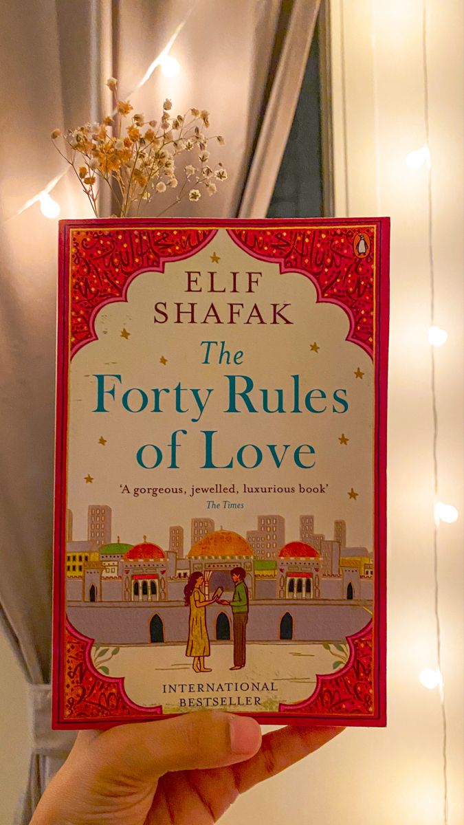 the forty rules of love by effie shafak is held up in front of a window