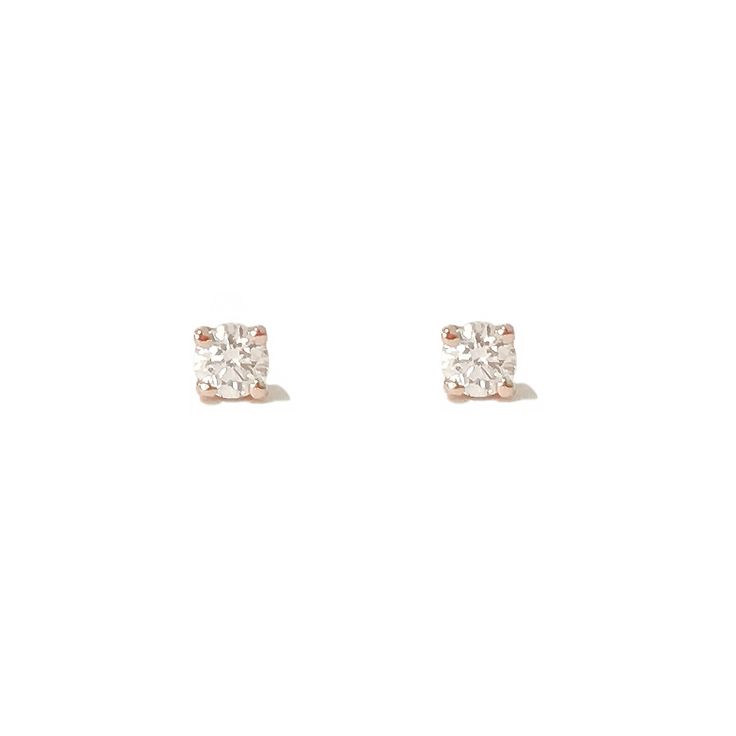 "This finely handcrafted tiny solitaire stud earring is made with a 1mm (diameter) genuine GVs1 quality round brilliant cut natural real Diamond & set into a traditional four prong setting composed of 14K solid gold. Comes with secure matching 14K solid gold earring backs. ♦ Diamond Dimensions: approximately 1.5mm (d) ♦ Post Thickness: 20 gauge (0.8mm) ♦ Metal Finish: High Shine Polish ♦ This design is available in Rose, White & Yellow 14K Gold ♦ Backing Type: your choice of Push Back or Minimalist Rose Gold Earrings With Prong Setting, Minimalist Rose Gold Earrings With Single Diamond, Everyday White Gold Solitaire Earrings, Minimalist Diamond White Solitaire Earrings, Minimalist Solitaire Round Cut Earrings, Rose Gold Single Diamond Earrings For Gift, Everyday White Diamond Earrings With Single Diamond, Minimalist White Diamond Earrings With Single Diamond, Minimalist White Diamond Earrings With Single Stone