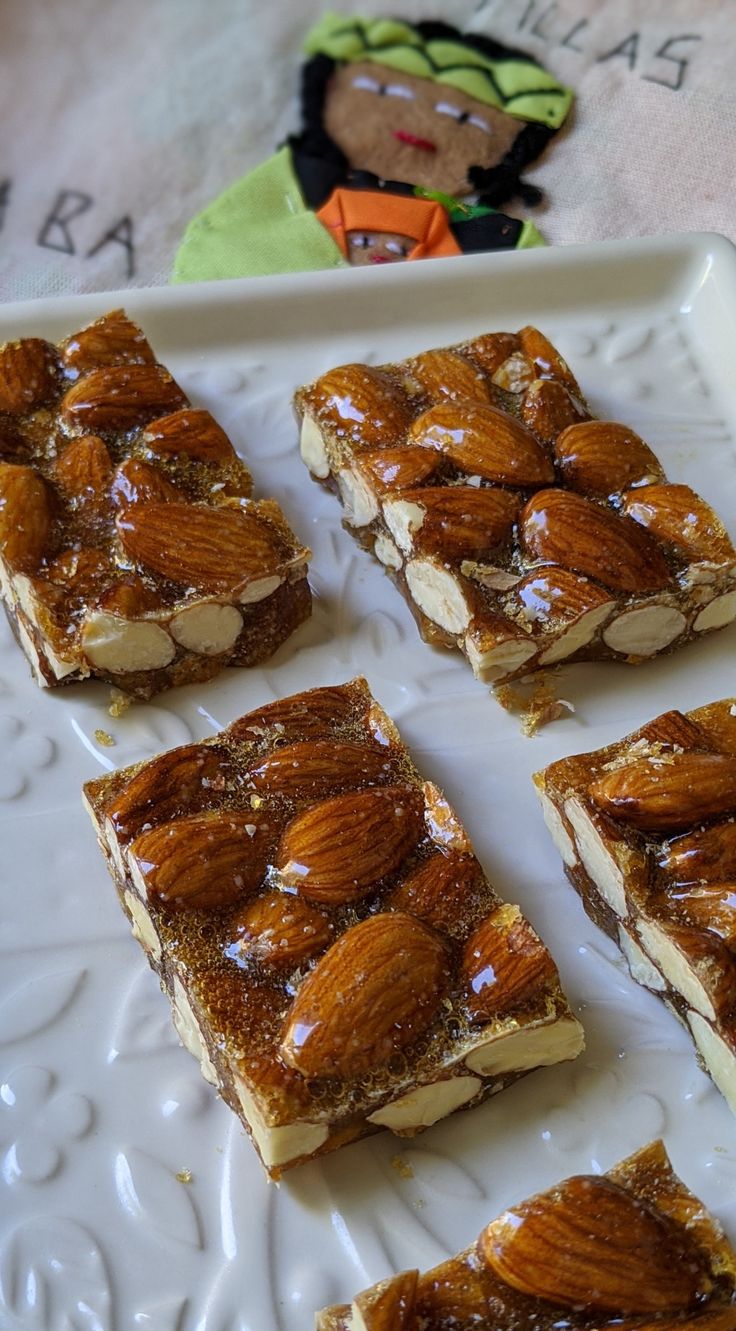 several pieces of dessert on a white plate