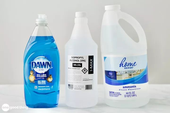 three different types of cleaning products sitting on a counter top, one is blue and the other is white