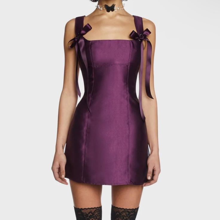 Dark Purple Dollskill Dress "Current Mood." Adjustable Bow Straps And Zipper Up Back, Super Flattering And Beautiful Fitted Dress. Tags Are Pinned Attached. Satin Mini Dress For Costume Party, Satin Mini Dress For Summer Costume Party, Summer Satin Mini Dress For Costume Party, Purple Flirty Evening Mini Dress, Flirty Purple Evening Mini Dress, Flirty Purple Mini Dress For Evening, Purple Mini Dress For Costume Party, Purple Sleeveless Mini Dress For Costume Party, Current Mood Clothing