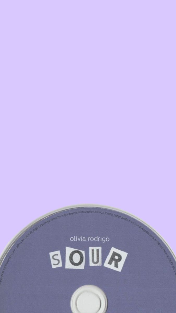 a cd with the word sour on it in front of a purple and white background