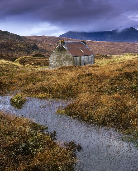 an old abandoned house in the middle of nowhere