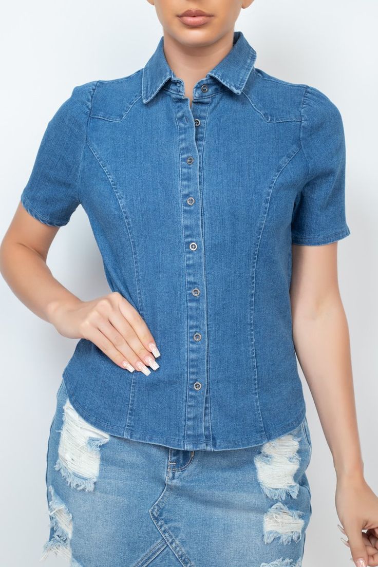 Imported S.M.L A woven denim top featuring a basic collar, button-down front closure, short puff sleeves, princess seams, curved hem, and waist-length. 63% Cotton 32% Polyester 3% Rayon 2% Spandex Medium Denim IRI Button-down Collared Denim Top Item Measurements: SIZE S Measurements: SIZE S Length:" Waist:" Bust:" Modest Shirt, Denim Chic, Princess Seams, Simple Chic, Denim Button Down, Sporty Look, Colored Denim, Work Attire, Waist Length