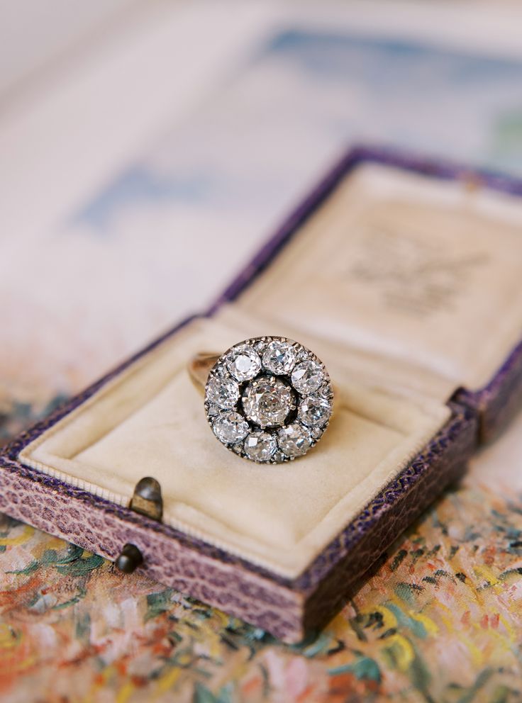 Antique Old Mine Cut Diamond Cluster Ring The Wrenley ring is an authentic antique diamond cluster ring from the Georgian Era circa 1820. The ring centers an approximately 1-carat Old Mine Cut diamond surrounded by a halo of 8 smaller Old Mine Cut diamonds, all totaling approximately 3.20 carats. All of the diamonds are approximately J-K in color, VS-SI clarity. The stones are set in a silver-topped 14kt yellow gold setting with a closed back. The ring is currently size 8.75 and can be resized! Victor Barbone Jewelry, Georgian Era, Old Mine Cut Diamond, Golden Ring, Silver Tops, Yellow Gold Setting, Antique Diamond, Diamond Cluster Ring, Gold Set