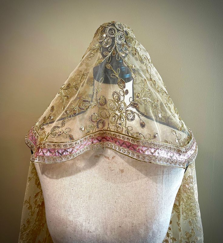 Absolutely dreamy golden embroidered Medieval style veil. Excellent for dramatic photo shoots, weddings, garden parties and whatever else! Lined with a lovely handmade pink/gold embroidered ribbon. Ceremonial Bohemian Fitted Dupatta, Fitted Bohemian Dupatta For Ceremonial Occasions, Festival Organza Dupatta With Gold Embroidery, Traditional Organza Dupatta With Gold Embroidery, Elegant Gold Embroidered Dupatta For Wedding, Wedding Dupatta With Gold Embroidery, Gold Wedding Dupatta With Intricate Embroidery, Gold Bollywood Headpiece For Wedding, Organza Dupatta With Gold Embroidery For Festivals