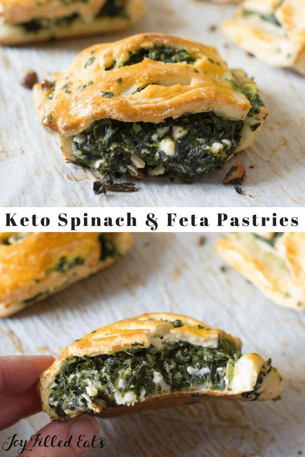 spinach and feta pastries on a baking sheet with the rest cut in half