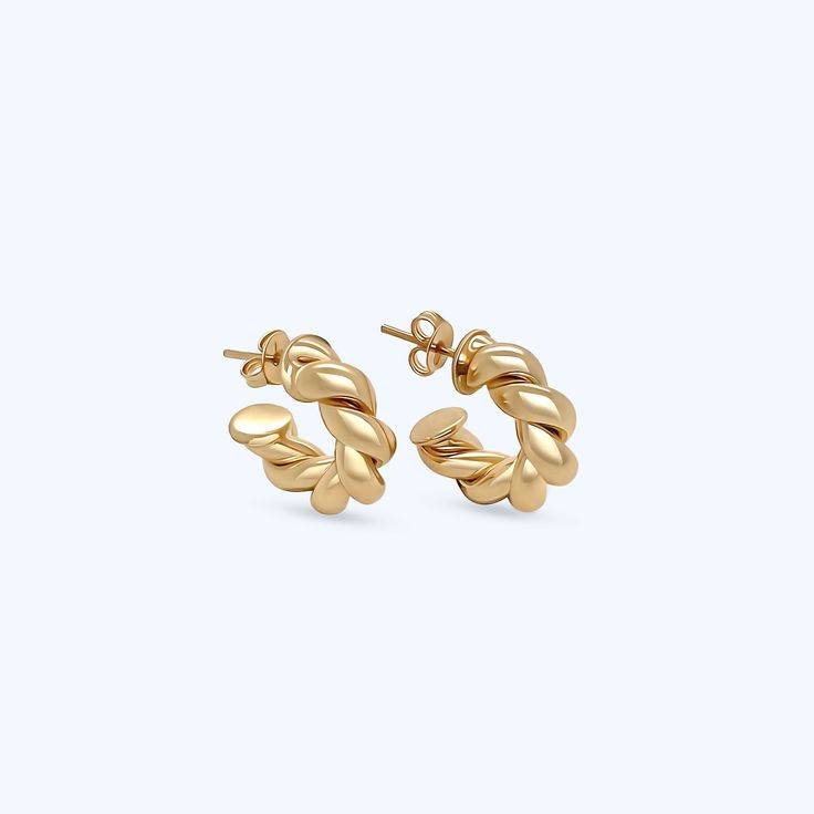 Named after our mother/grandmother, the Barbara twisted earrings are a modern take on a pair of her much loved hoops. Two intertwined polished gold strands create the classic circular shape. **Gold filled 14k gold over brass. *Waterproof. 3 Sizes Barbara diameter is 1.25" Mini Barbara diameter is .75" Huggie diameter is .50" *Waterproof but will be damaged by chlorine and other harsh liquids. **Our gold filled earrings have layers of 14k gold over brass. They have the look and color of solid gol Twisted 14k Gold Earrings, Twisted Gold Plated Yellow Gold Hoop Earrings, Gold Earrings With A Modern Twist, Modern Twist Gold-plated Hoop Earrings, Modern Twist Gold Plated Hoop Earrings, Twisted Yellow Gold Hoop Earrings, Tarnish Resistant, Gold Tarnish Resistant Huggie Earrings With Modern Twist, Gold Huggie Earrings With Modern Twist, Tarnish Resistant, Modern Twisted Jewelry With Polished Finish