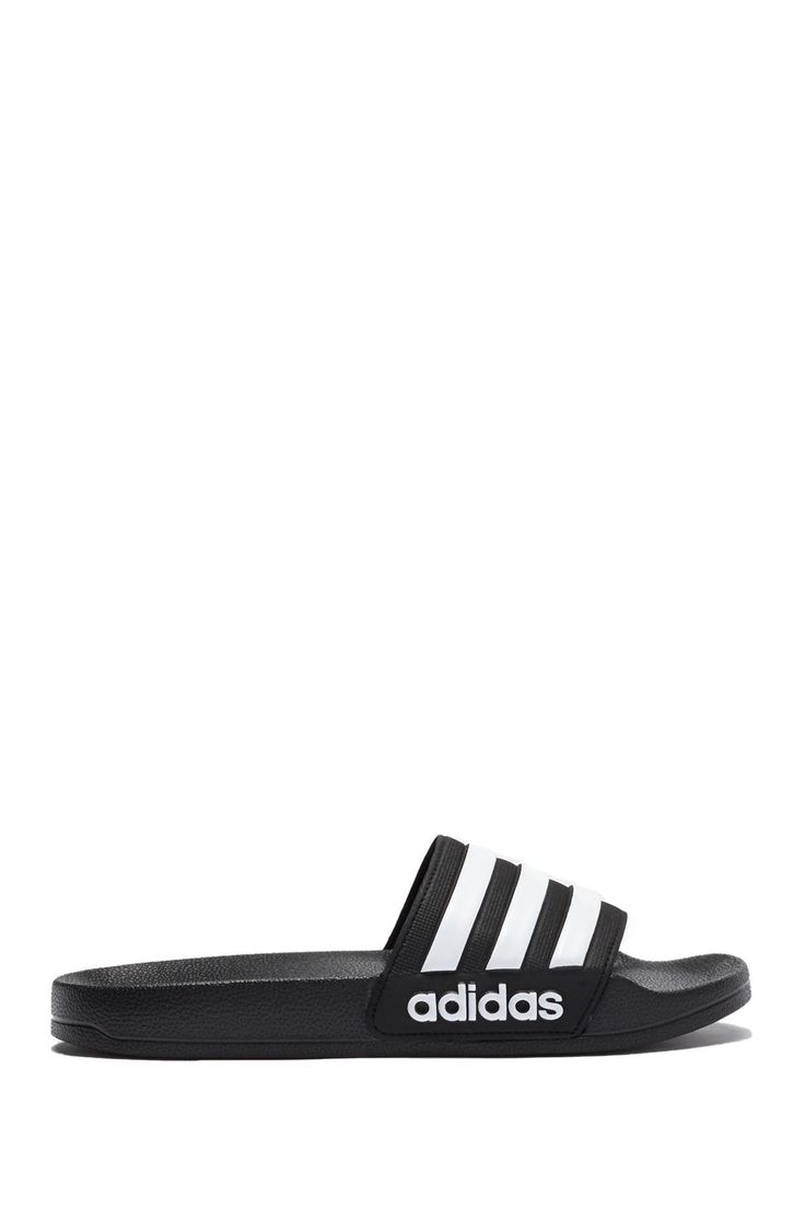 The iconic Adidas 3 stripe logo lines these causal shower slides. Whole sizes only, for 1/2 sizes, order next size up Manmade upper and sole Adidas Slides For Swimming With Logo, Adidas Slides For Swimming, Adidas Slides With Logo For Swimming, Black Adidas Slides For Summer, Adidas Slides With Logo For Beach, Adidas Black Slides With Logo, Adidas Black Slides For The Beach, Adidas Black Slides For Beach, Adidas Adilette