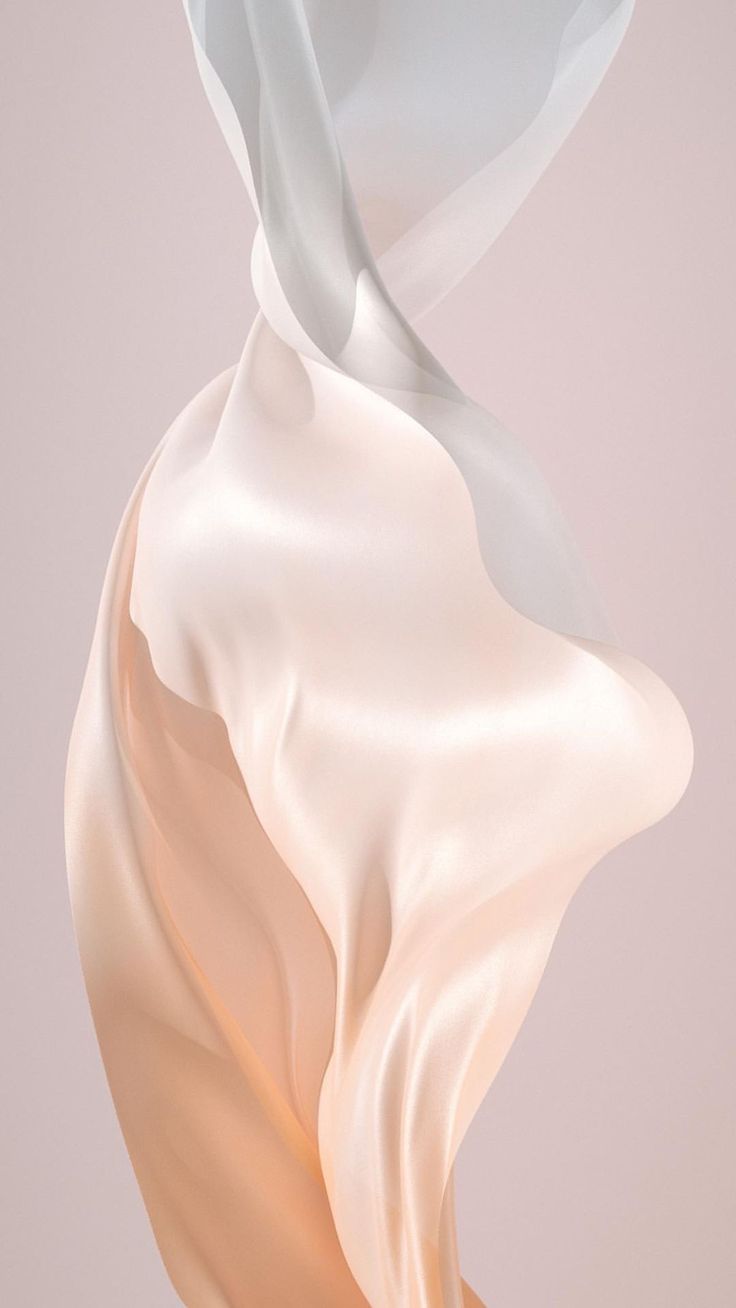 an abstract photo of white flowing fabric on a pink background, with the image blurred and blurry