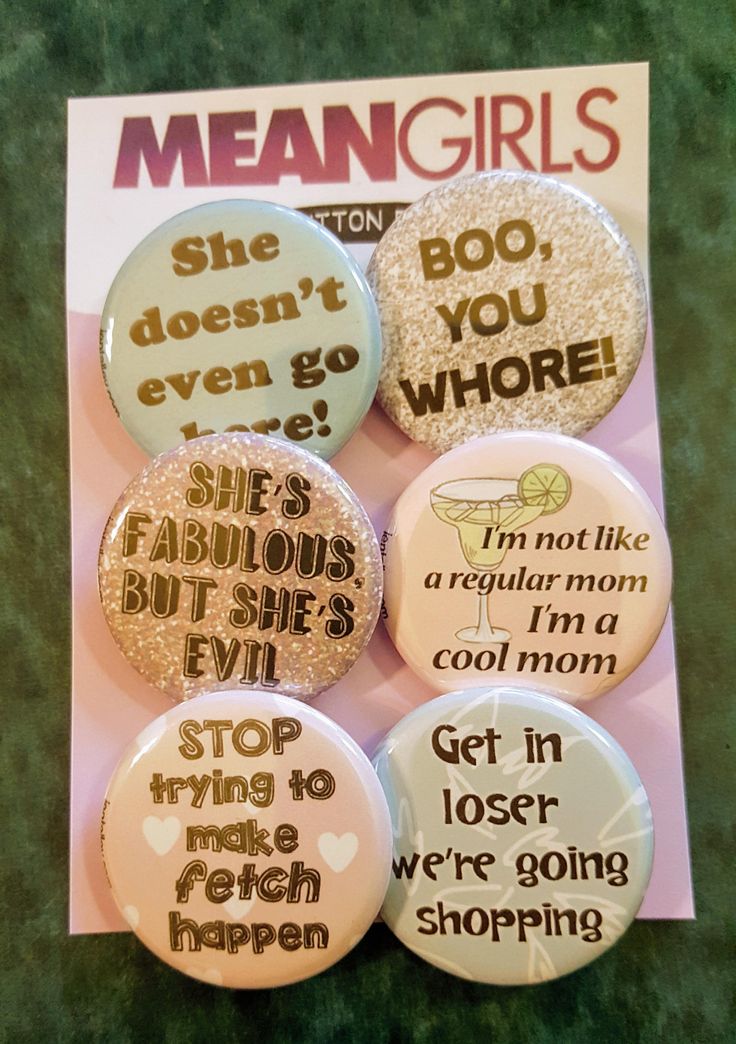 four pinback buttons that say, she doesn't even go to the shops