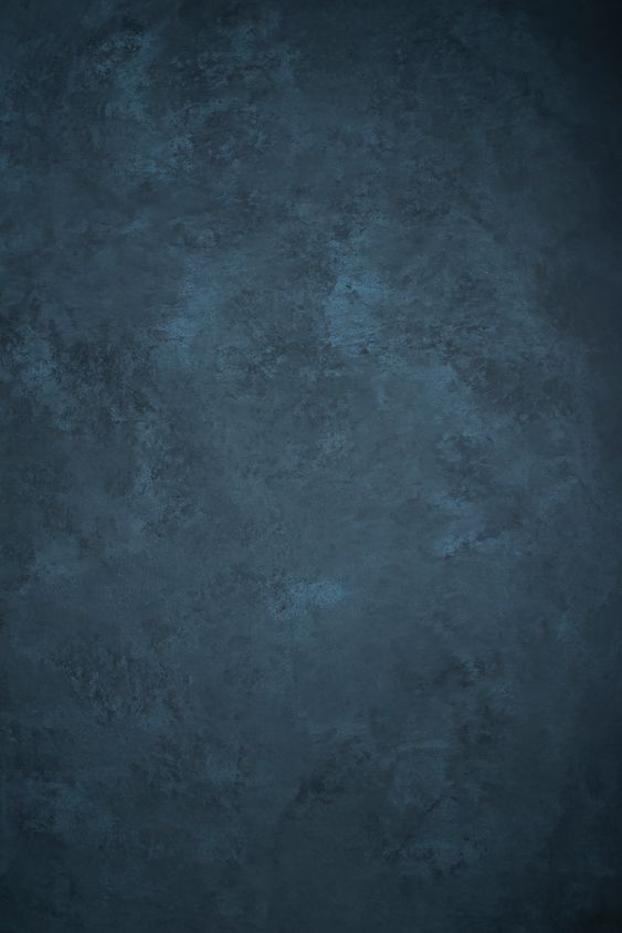 a dark blue background with some stains on it