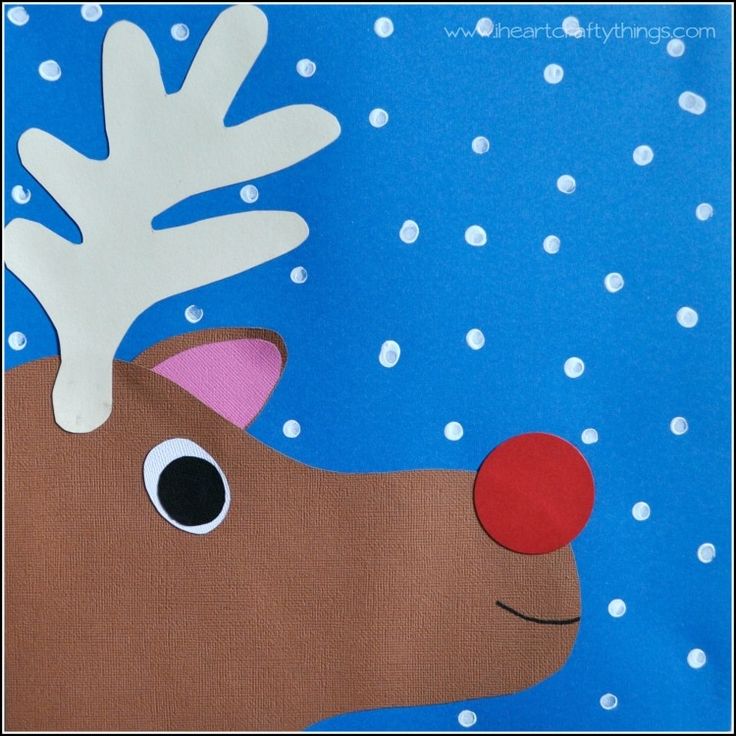 a close up of a paper cut out of a reindeer