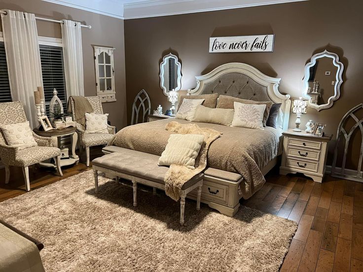 a bedroom with a large bed and lots of furniture