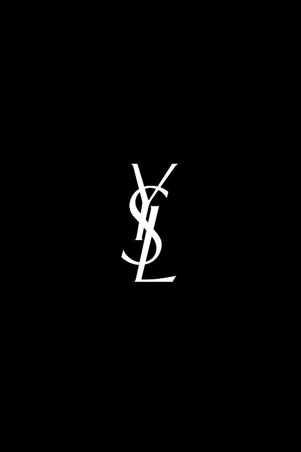 a black and white logo with the letter y in it's center, on a dark background