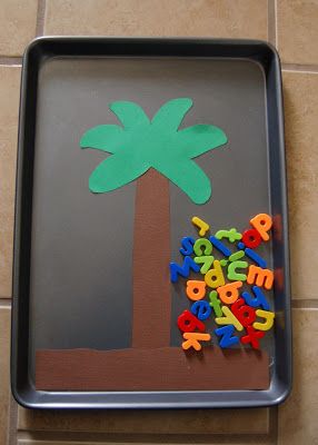 a tray with letters and a palm tree on it