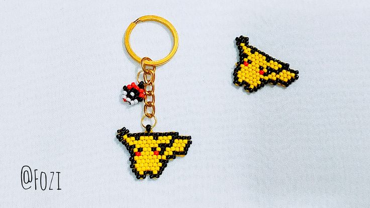 two keychains made to look like pokemon pikachu