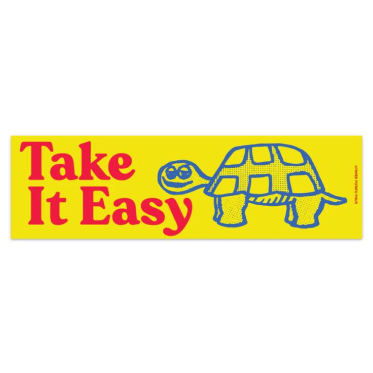 a yellow bumper sticker that says take it easy with a blue turtle on it