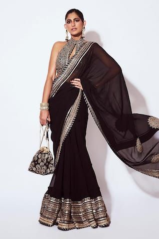 Black pre-draped saree with zari thread, leheriya gota, sequin embroidered border. Paired with halter neck embroidered bralette blouse. - Aza Fashions Black Sari, Gopi Vaid, Drape Saree, Black Drapes, One Shoulder Top, Stylish Sarees, Gold Embroidery, Saree Look, One Shoulder Tops