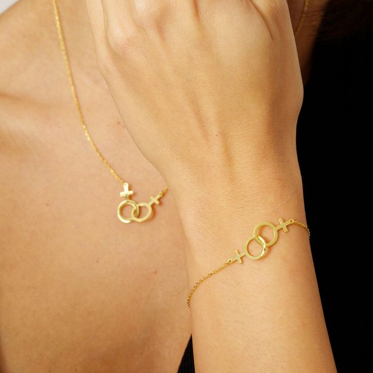 Show off your pride with this silver chain bracelet featuring the iconic Venus symbol - a subtle yet powerful statement. Perfect for everyday wear or as a gift for your loved one. Celebrate love and equality with this unique piece of jewelry. Pair it with our matching necklace for a complete set. Metal: 925 sterling silver Plating: 18k yellow / white / rose gold vermeil Chain type: cable link Hypoallergenic: made with nickel-free materials, safe for those with metal allergies Sapphic Bracelet, Lesbian Jewelry Fashion, Modern Hypoallergenic Jewelry For Friendship, Elegant Necklaces For Friendship, Stainless Steel Chain Bracelet For Friendship, Minimalist Promise Jewelry, Elegant Necklace For Friendship, Delicate Chain Jewelry For Friendship, Symbolic Stainless Steel Jewelry