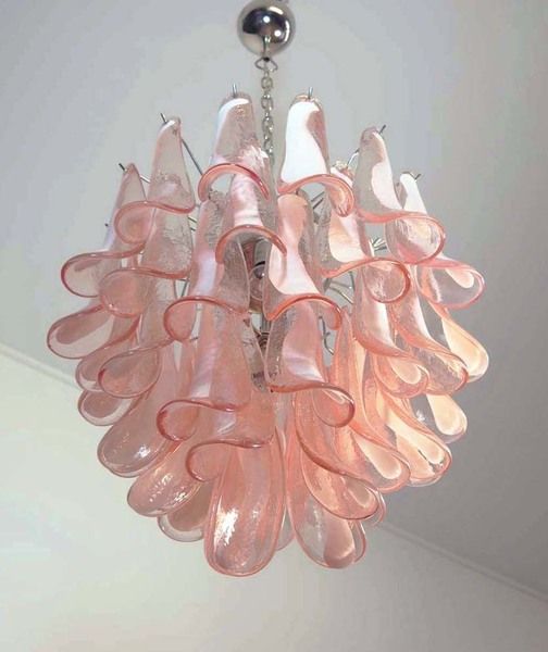 a pink chandelier hanging from the ceiling