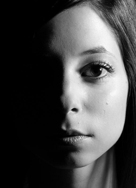 a black and white photo of a woman's face