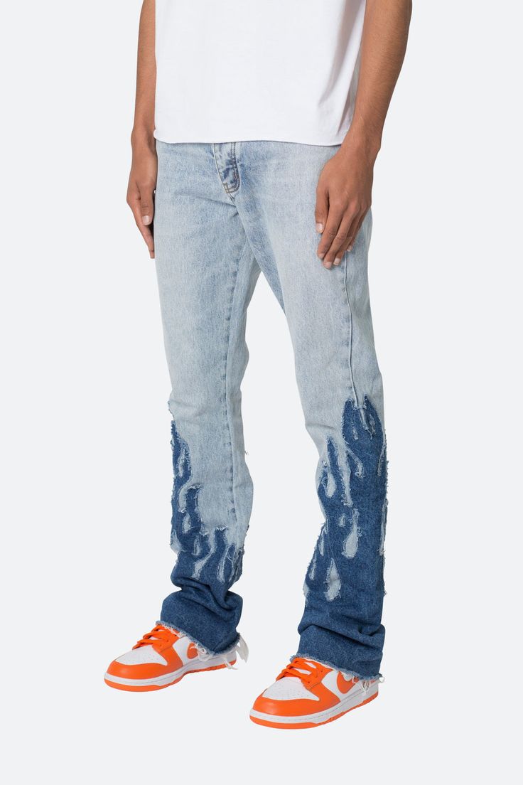 the B556 Flame Flare Denim are designed with our new B fit, which is slim through the thigh and features a slight flare at the leg opening and is constructed from light washed blue denim, panelling at the inseam and outseam from contrasting blue denim for a slight flare and finished with contrasting self fabric flame p Distressed Blue Flare Jeans For Streetwear, Ripped Blue Flare Jeans In Rigid Denim, Washed Blue Denim Flare Jeans For Streetwear, Washed Blue Straight Fit Denim Bottoms, Light Wash Straight Fit Denim Bottoms, Straight Fit Washed Blue Denim Bottoms, Fitted Light Indigo Straight Leg Jeans, Light Indigo Fitted Straight Leg Jeans, Denim Flare Jeans With Straight Fit