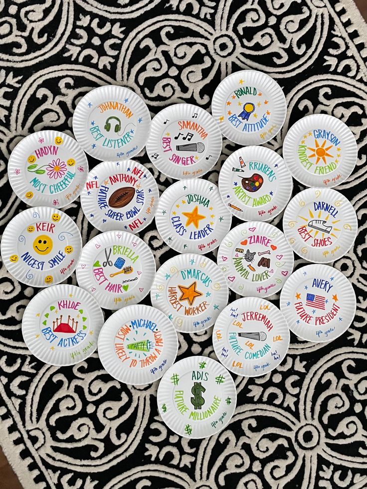 there are many paper plates that have different designs on them, including the words happy birthday