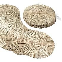 a set of four round straw placemats on a white background with the same pattern as the rest of the table