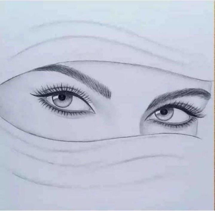 a drawing of a woman's face with her eyes closed and long eyelashes drawn on paper