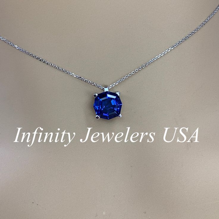 "This necklace is a web cut lab created blue sapphire, 18\"cable chain, 14k white gold #6390 September Birthstone -Approximate total carat weight: 3.30ctw diamond equivalent -Center Stone Size: 9x9mm approx. 3.30ct diamond equivalent -Center Stone Shape: web cut / octagon -Gem Type: lab created blue sapphire -Stone Clarity: VS2 -Stone Color: blue -Moh's Scale: 9 hardness -Metal Type and Purity: 14k white gold -Setting: 4 prong basket -Chain: 18\" delicate 14k gold chain / heavier option with lob Sapphire Jewelry With Brilliant Cut As A Gift, Elegant Sapphire Jewelry With Brilliant Cut For Gift, White Gold Jewelry With Diamond Cut Lab-created Sapphire, Blue Diamond Cut Necklace In Sterling Silver, Sapphire Sterling Silver Necklace With Diamond Cut, Blue Cubic Zirconia Necklace With Diamond Cut, Lab-created Sapphire Jewelry With Brilliant Cut, Brilliant Cut Lab-created Sapphire Jewelry, Diamond Cut Lab-created Sapphire Necklace As Gift